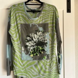 Fun Fall outfit! Sheer netting type fabric with fun print.